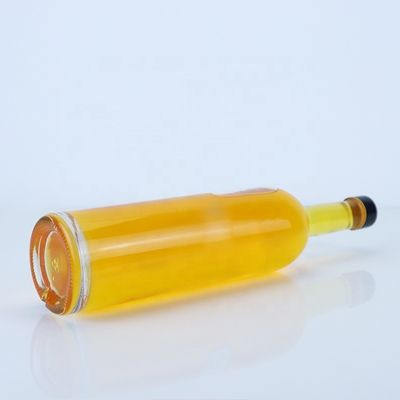 Custom Logo 700ml 750ml High Flint Round Shape Glasflasche mit Schraubendeck