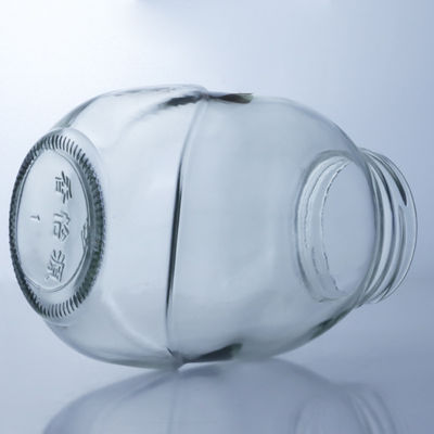 Durchsichtige runde Glasflasche für die Handhabung der Decal-Oberfläche in der Lebensmittelproduktionslösung
