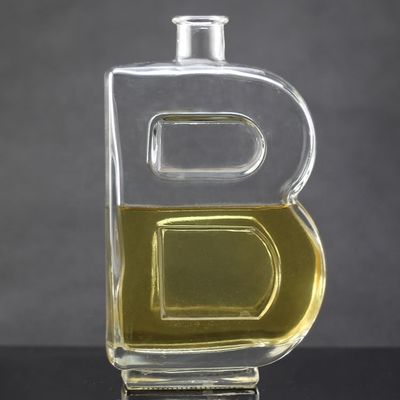 Grundmaterial Glasflasche mit einzigartiger Buchstabenform und Korkkappe