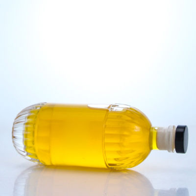 Glasflasche für industrielle Getränke mit geprägter Form und rundem Kork