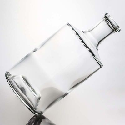 Durchsichtige oder kundenspezifische runde 750 ml 1000 ml Glasflasche mit Holzkork für Whisky